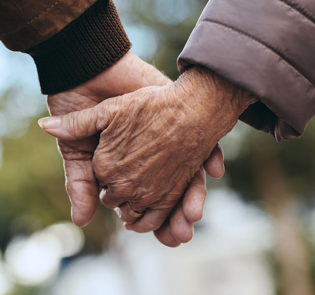 two people holding hands